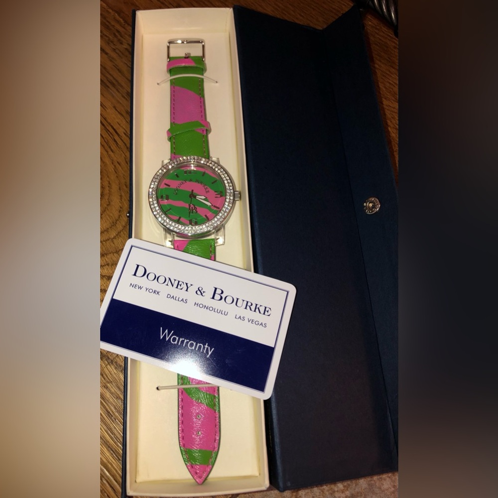 Dooney & Bourke wrist watch. Pink & Green. Genuine Leather. NIB. Warranty card.